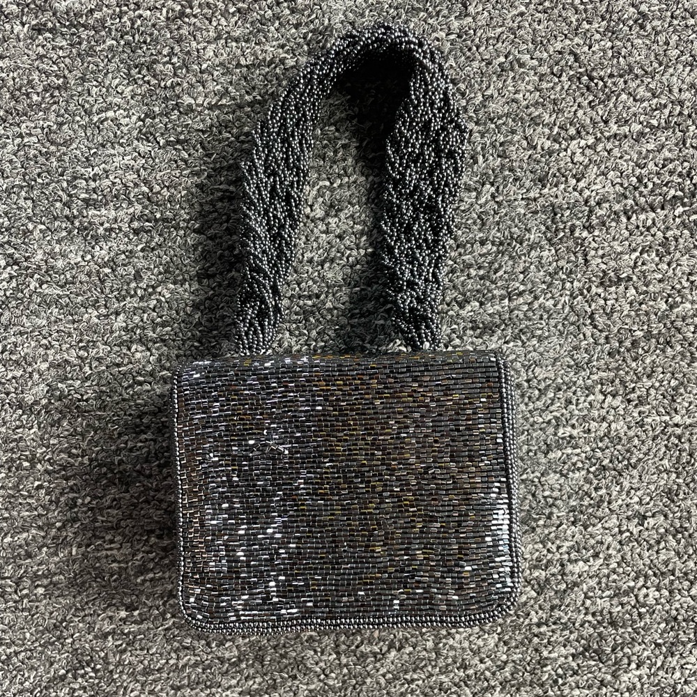 Sharmark Chic Black Clutch with Sleek Design